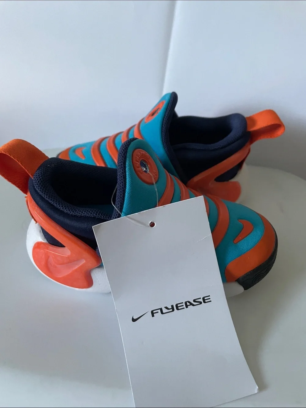 Nike Kids Turquoise and Orange Slip-On Wave Sneakers